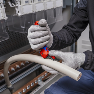 COUTEAU A DEGAINER AVEC SABOT DE GUIDAGE BI MATIERE