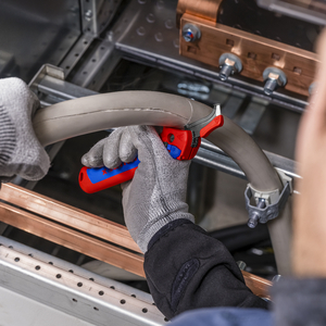 COUTEAU A DEGAINER AVEC SABOT DE GUIDAGE BI MATIERE